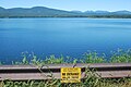 * Nomination: Ashokan Reservoir in Ulster County, New York. Juliancolton 05:37, 28 September 2009 (UTC) * Review  Comment Good, but the lake shore is slightly distorted. Can you straighten it?. --Cayambe 08:01, 28 September 2009 (UTC) I can't see a distortion, but the focus apparently was set to the foreground (sign etc.), as a result the lake itself and the hills are rather blurry. -- H005 08:53, 6 October 2009 (UTC) (